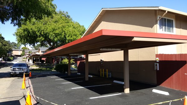 Carport Replacement - This is a carport that was damaged in an earthquake, we ended up removing the old wood structure and replacing with a new metal cover that was up to code and earthquake compliant.