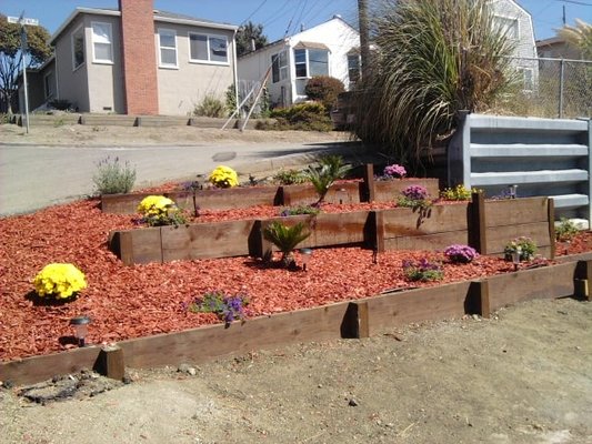 Gardening - We can create any landscape that you like. Featured in this portfolio is the creation of retainer walls to provide height and showcase a color palette of plants to bright up any yard. Also if you already have a beautiful landscape we can help maintain it allowing of your natural landscape to be enjoyed. In all designs we look to incorporate natural materials as seen in the fencing and pathways created. Gardening - We can create any landscape that you like. Featured in this portfolio is the creation of retainer walls to provide height and showcase a color palette of plants to bright up any yard. Also if you already have a beautiful landscape we can help maintain it allowing of your natural landscape to be enjoyed. In all designs we look to incorporate natural materials as seen in the fencing and pathways created.