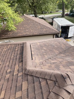 Roof Remodel - This was a very outdated shingle roof that need so much need love. Did a complete demo of old roof and installed a new rubber and shingled roof