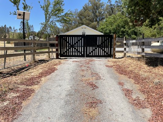 Solar-Powered Double Swing Automatic Gate Installation LiftMaster - The customer had called our company and explained to us that they had a very hard time to get in and out of their very old gate. We listened to the customer’s request and made sure to create the most perfect gate for their property. In this project, we created two iron gates in our shop. We installed a LiftMaster Smart Gate Operator which is powered by solar. Solar-Powered Double Swing Automatic Gate Installation LiftMaster - The customer had called our company and explained to us that they had a very hard time to get in and out of their very old gate. We listened to the customer’s request and made sure to create the most perfect gate for their property. In this project, we created two iron gates in our shop. We installed a LiftMaster Smart Gate Operator which is powered by solar.