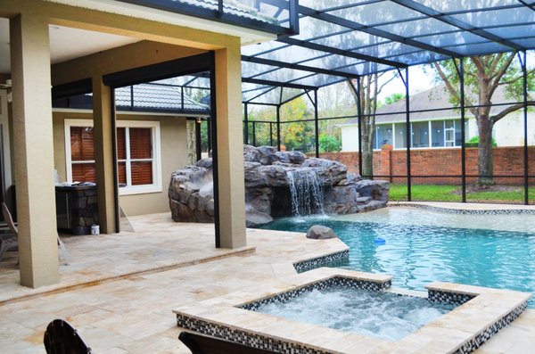 Pavers on Pool Deck - Installing new pavers around your pool area offers both aesthetic and practical benefits. They come in various styles and colors, allowing you to customize the look to complement your pool design and overall backyard. Pavers can create a sophisticated, seamless appearance, transforming your pool area into a stylish, inviting space for relaxation and entertainment.

Additionally, pavers are slip-resistant, making them an excellent choice for poolside areas, as they reduce the risk of slips or falls when wet. Easy to maintain, individual pavers can be replaced if needed, offering a long-lasting and cost-effective solution for your poolside area that enhances both safety and visual appeal.