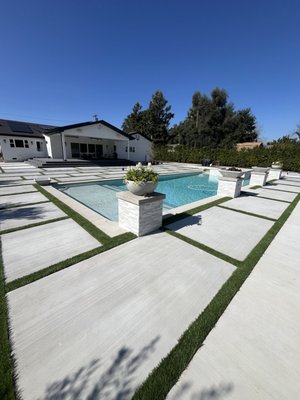 North hills pool deck - This pool deck turned out to be a complete masterpiece . Turf strips and broom finish concrete was the perfect combination. Customer was very happy with the outcome . North hills pool deck - This pool deck turned out to be a complete masterpiece . Turf strips and broom finish concrete was the perfect combination. Customer was very happy with the outcome .