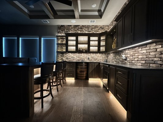 Kitchen lighting addition - This lighting installation was done for a client that wanted to illuminate the bar area in their “man cave”! Another happy client, another day at the office! Kitchen lighting addition - This lighting installation was done for a client that wanted to illuminate the bar area in their “man cave”! Another happy client, another day at the office!
