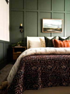 Autumn's Embrace - Shweta transformed the small guest bedroom into a serene retreat. She designed a board and batten accent wall and a soothing color scheme to visually enlarge the space, added practical storage solutions, and created a cozy reading nook. The result was a tranquil and inviting room perfect for relaxation. Autumn's Embrace - Shweta transformed the small guest bedroom into a serene retreat. She designed a board and batten accent wall and a soothing color scheme to visually enlarge the space, added practical storage solutions, and created a cozy reading nook. The result was a tranquil and inviting room perfect for relaxation.