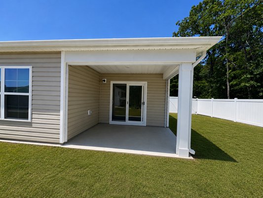 Gibsonville, NC Screened Porch Transformation - Custom screened porch installation in Gibsonville, NC featuring durable screen walls, clean aluminum framing, and a comfortable outdoor living space perfect for relaxing and enjoying the backyard year-round. Installed by Carolina Backyard Living.