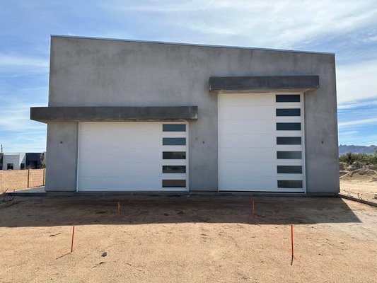 Big Sky Custom Home - Scottsdale - This was a home built by Big Sky Custom Homes that reached out to us to install a total of seven garage doors. There were a total of three doors on the home and four on the detached garage structure.