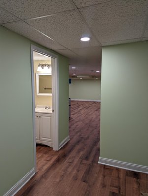 Finished Basement - Completed this spacious basement in Des Plaines, IL, in 2024. From bare concrete foundation walls, to adding a bedroom, full bath, and entertainment space with a mini bar! Finished Basement - Completed this spacious basement in Des Plaines, IL, in 2024. From bare concrete foundation walls, to adding a bedroom, full bath, and entertainment space with a mini bar!