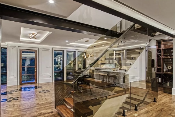 Modern Staircase - This custom staircase was part of a modern remodel we recently completed. Free estimates available on all projects. Call now for more information.