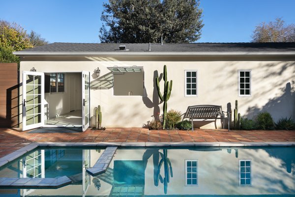 Pool side ADU construction in Studio City - An ADU that will be mostly used as a pool house.
Large French doors with a good-sized awning window to act as a serving point from the interior kitchenette to the pool side.
A slick modern concrete floor finish interior is ready to withstand the heavy traffic of kids playing and dragging in water from the pool.
Vaulted ceilings with whitewashed cross beams provide a sensation of space.
An oversized shower with a good size vanity will make sure any guest staying over will be able to enjoy a comfort of a 5-star hotel. Pool side ADU construction in Studio City - An ADU that will be mostly used as a pool house.
Large French doors with a good-sized awning window to act as a serving point from the interior kitchenette to the pool side.
A slick modern concrete floor finish interior is ready to withstand the heavy traffic of kids playing and dragging in water from the pool.
Vaulted ceilings with whitewashed cross beams provide a sensation of space.
An oversized shower with a good size vanity will make sure any guest staying over will be able to enjoy a comfort of a 5-star hotel.