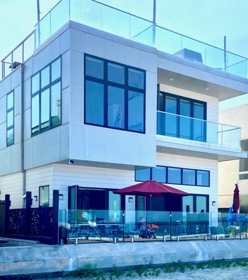 Modern Imperial Beach Duplex on the sand - This new duplex is located right on the ocean in Imperial Beach.  It was designed to take advantage of the views and for the unique lifestlye of the clients.  The home includes a music loft and art studio as well as storage and niches  to display their many artifacts.
