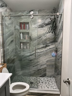 Bathroom Remodel - Both bathrooms originally had a tub and we replaced them with walk in showers.