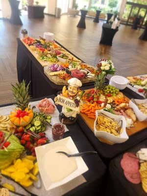Grazing Table - 250 Guest Grazing Table. Several cheeses, meats, fruits, vegetables, and accoutrements.