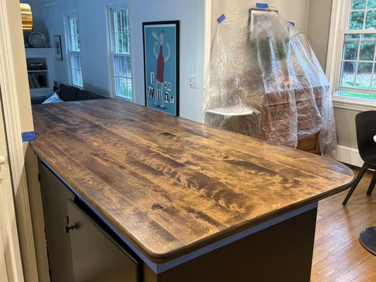 Countertop Refinishing, Provincial Stain, 2026 - These White Oak Countertops had been well loved for dinners, homework, and playtime.  After sanding them, we conditioned the wood, stained them, and coated them, ensuring they will see much more enjoyment from our clients!