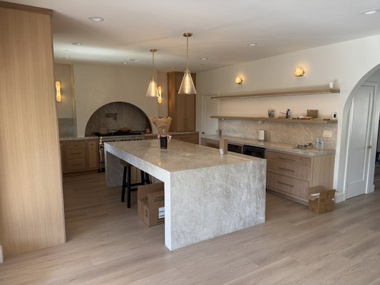Carl Court kitchen and living room updates - This remodel was done after a pipe broke on the second floor. Looks like a blessing in disguise!