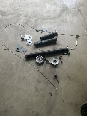 Overhaul￼ - This is an overhaul replacing all parts that move on the garage door.￼