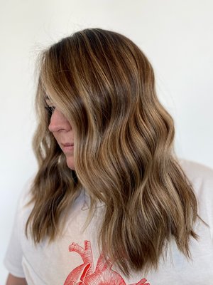 Shayna: Customized Color Specialist, Level 4 Stylist - With 12 years in the hair industry, Shayna has been creating beautiful, customized looks since graduating from the Aveda Institute in 2013. Inspired by her grandmother’s home salon and a family full of hair professionals, she turned a familiar passion into a lifelong career.
She specializes in customized color and working with beautiful, dense hair, always tailoring each style to the guests unique texture and personality. Her top hair advice? A trim or a treatment every time!
A few of her must-haves: Oribe Dry Texture Spray for weightless volume, Amika Superfruit Star Oil for frizz-free hydration, and Lush Good Karma Shower Gel for that nostalgic earthy scent.
Her hair inspirations include Briana Cisneros, Jude Viola, and other industry powerhouses whose creativity fuels her own. Whether you want a bold change or a subtle refresh, Shayna blends skill and care to make your hair dreams a reality. Shayna: Customized Color Specialist, Level 4 Stylist - With 12 years in the hair industry, Shayna has been creating beautiful, customized looks since graduating from the Aveda Institute in 2013. Inspired by her grandmother’s home salon and a family full of hair professionals, she turned a familiar passion into a lifelong career.
She specializes in customized color and working with beautiful, dense hair, always tailoring each style to the guests unique texture and personality. Her top hair advice? A trim or a treatment every time!
A few of her must-haves: Oribe Dry Texture Spray for weightless volume, Amika Superfruit Star Oil for frizz-free hydration, and Lush Good Karma Shower Gel for that nostalgic earthy scent.
Her hair inspirations include Briana Cisneros, Jude Viola, and other industry powerhouses whose creativity fuels her own. Whether you want a bold change or a subtle refresh, Shayna blends skill and care to make your hair dreams a reality.