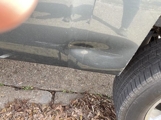 before and after - This repair was done on the quarter panel  of a pickup truck a common place for dents