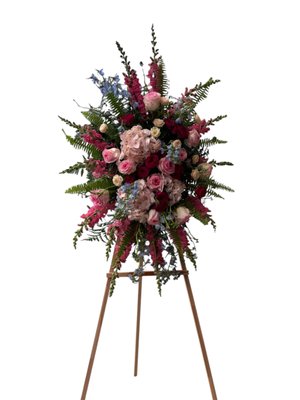 Funeral - Our compassionate florists specialize in creating custom funeral and memorial arrangements that celebrate the unique personality of your loved one. We can incorporate personal touches to design standing sprays, casket sprays, or wreaths that reflect their passions, hobbies, or favorite colors