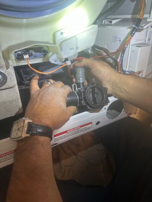 Whirlpool Washer - Drain Pump Motor Replacement - This Whirlpool washer wasn't draining properly, leaving clothes soaked at the end of the cycle. Our team removed the drain hose and boot and found the culprit: a blockage of foreign objects and debris had built up inside, restricting water flow. We cleared the obstruction, replaced the worn drain pump motor, and reassembled and tested the unit through a full cycle. After the repair, the washer was draining completely and running smoothly again. Whirlpool Washer - Drain Pump Motor Replacement - This Whirlpool washer wasn't draining properly, leaving clothes soaked at the end of the cycle. Our team removed the drain hose and boot and found the culprit: a blockage of foreign objects and debris had built up inside, restricting water flow. We cleared the obstruction, replaced the worn drain pump motor, and reassembled and tested the unit through a full cycle. After the repair, the washer was draining completely and running smoothly again.