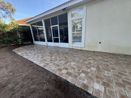 Paver patio installation - We removed old pavers, rocks, debris and installed 400 sq ft patio.