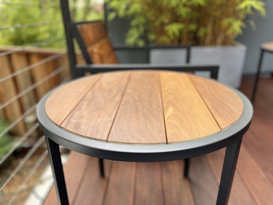 Amber-colored backyard furniture - The deck and the furniture have to be refinished. The first step is thorough power washing, the second step is careful oiling, and the result is an amber-colored, impeccable surface that blends seamlessly into the backyard landscape. Amber-colored backyard furniture - The deck and the furniture have to be refinished. The first step is thorough power washing, the second step is careful oiling, and the result is an amber-colored, impeccable surface that blends seamlessly into the backyard landscape.