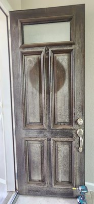 Front door restoration - This front exterior door lacked color, stain, and appearance. With our expertise, we applied the correct stain and coat to give it a lasting protection. Front door restoration - This front exterior door lacked color, stain, and appearance. With our expertise, we applied the correct stain and coat to give it a lasting protection.