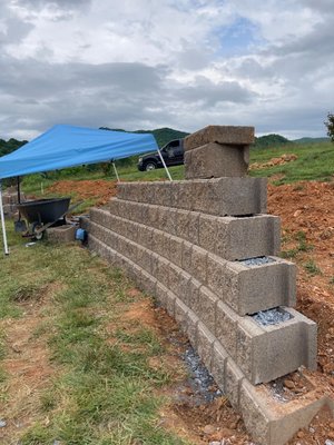 Retaining Wall Project - This was a 6' ft Retaining Wall that we did for one of our clients. Retaining Wall Project - This was a 6' ft Retaining Wall that we did for one of our clients.
