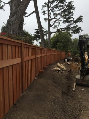 Capped Redwood Fence - We replaced some old grapestake fencing with some beautiful, capped redwood!