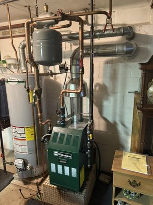 Basic Oil to Gas Conversion 84% - This is an example of a basic oil to gas conversion. We used the existing chimney for the new boiler after a thorough cleaning. This project was completed in 1 day.