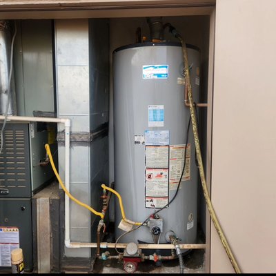 Tankless Water Heater - 75-gallon gas heater out and new tankless in.