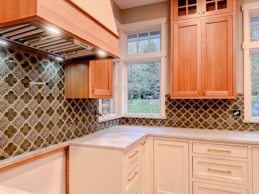 Vashon Island Kitchen Remodel | DM Construction Group LLC - Vashon Island Kitchen Remodel | DM Construction Group LLC
This custom kitchen remodel on Vashon Island showcases the perfect blend of modern elegance and handcrafted quality. We installed a unique patterned tile backsplash that adds character and depth, paired with natural wood cabinetry and a seamless vent hood insert. The light quartz countertops provide a clean, timeless finish that ties the entire space together.
Every detail — from the under-cabinet lighting to the precision tile work — reflects our commitment to craftsmanship and functionality.
If you’re on Vashon Island or in the greater Puget Sound area and looking to update your kitchen, DM Construction Group LLC is here to bring your vision to life. Vashon Island Kitchen Remodel | DM Construction Group LLC - Vashon Island Kitchen Remodel | DM Construction Group LLC
This custom kitchen remodel on Vashon Island showcases the perfect blend of modern elegance and handcrafted quality. We installed a unique patterned tile backsplash that adds character and depth, paired with natural wood cabinetry and a seamless vent hood insert. The light quartz countertops provide a clean, timeless finish that ties the entire space together.
Every detail — from the under-cabinet lighting to the precision tile work — reflects our commitment to craftsmanship and functionality.
If you’re on Vashon Island or in the greater Puget Sound area and looking to update your kitchen, DM Construction Group LLC is here to bring your vision to life.