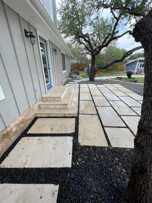 Flagstone patio - There was an existing old deck and the customer wanted a more home environment when his family went outside. So we created this awesome patio where he can walk out and have family time with his loves ones