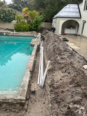 Pool Repair Avila Community Tampa, Florida - The crew has started this massive pool remodel in the beautiful neighborhood of Avila , Tampa . Over 2,000 square feet of new travertine going in. Customer wanted to add a spa and that is what we are creating.