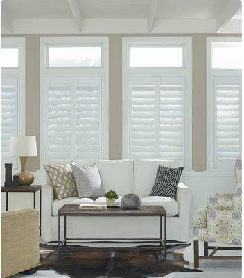 Custom Shutters - Custom shutters add an elegant touch to your home.  We offer a variety of options, including customized arches, single or bifold panels, hidden tilt bars and many more!