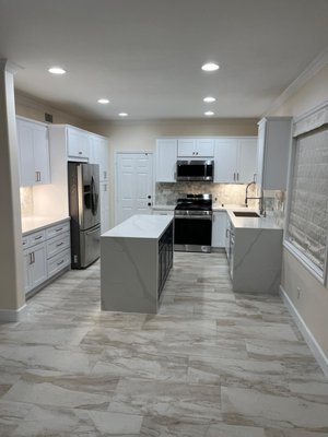 Aliso Viejo Remodel - This project was all about elevating comfort and style. We fully remodeled the kitchen with new cabinets, countertops, and appliances to create a modern, open-concept space perfect for everyday living and entertaining.
We also added a custom dry bar—complete with built-in shelving and lighting—to enhance both function and design. To complete the transformation, we replaced the flooring throughout the main living areas, giving the home a fresh, cohesive look. Aliso Viejo Remodel - This project was all about elevating comfort and style. We fully remodeled the kitchen with new cabinets, countertops, and appliances to create a modern, open-concept space perfect for everyday living and entertaining.
We also added a custom dry bar—complete with built-in shelving and lighting—to enhance both function and design. To complete the transformation, we replaced the flooring throughout the main living areas, giving the home a fresh, cohesive look.
