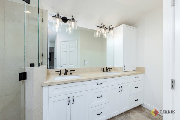 Rancho Peñasquitos Master Bath & Closet - These two are newly retired and are excited to get comfy and pursue more leisure activities, golf and quilting among them.
They wanted to keep their bathtub, enlarge the shower, install tile everywhere, and add a few additions of custom built-in storage.
Their selections included 3-Feel Cream 12x24 for wall tile, 3-Feel Cream 2x2 for shower pan, and gorgeous 94-tranquil hex mansion drive ts954 for the shampoo shelves. Her plumbing fixtures were Kholer in the finish oil rubbed bronze.
Kevin and the Teknik Clean Cut Crew ensured that all materials were received and verified before we got started. We had to pause the job zero times; Michelle and Steve loved The Perfect Remodel Plan! Scan the whole plan at https://teknikinc.com/about/. Rancho Peñasquitos Master Bath & Closet - These two are newly retired and are excited to get comfy and pursue more leisure activities, golf and quilting among them.
They wanted to keep their bathtub, enlarge the shower, install tile everywhere, and add a few additions of custom built-in storage.
Their selections included 3-Feel Cream 12x24 for wall tile, 3-Feel Cream 2x2 for shower pan, and gorgeous 94-tranquil hex mansion drive ts954 for the shampoo shelves. Her plumbing fixtures were Kholer in the finish oil rubbed bronze.
Kevin and the Teknik Clean Cut Crew ensured that all materials were received and verified before we got started. We had to pause the job zero times; Michelle and Steve loved The Perfect Remodel Plan! Scan the whole plan at https://teknikinc.com/about/.