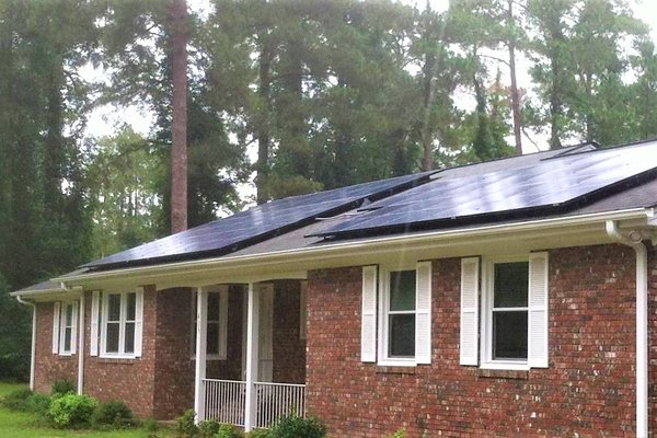 Solar Panel Installation in Darlington, SC - This homeowner of Darlington, SC has installed a rooftop solar electric system with our company. This 9.86 kW system includes SolarWorld solar panels, a SolarEdge inverter, 34 power optimizers, and complete monitoring capabilities. It is 9,860 watts of clean, solar energy and comes with a warranty that lasts for 25 years. Now this home is producing its own electricity and supporting the environment with renewable energy.

The solar process begins with a solar consultation to review your annual kilowatt consumption and design your custom solar energy system. Next, we bring you through financing and find the best arrangement that works for your budget and credit. After that, we inspect the property, obtain all necessary permits, and begin installation. Once installed, we receive permission to operate and connect your solar panels to the grid. With GST, everything is taken care of for you from start to finish.