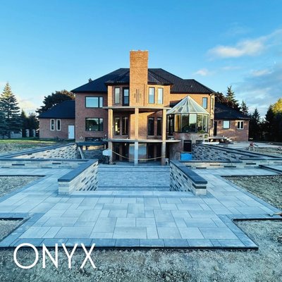 Project 3-2025 - A bold vision brought to life.
This fully custom hardscape was designed in collaboration with our in-house architects to complement the elegance of this estate. Every line, level, and layer was meticulously planned to create a seamless blend of luxury and structure. From the symmetry to the material selection, this project is a true example of what’s possible when design meets craftsmanship.