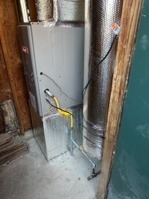 Rental unit budget friendly change out - This rental unit furnace was no longer functional and was not worth fixing. We replaced it, completed all code required upgrades, fabricated a sheet metal enclosure to stop pests, upgraded the thermostat wire and installed a smart thermostat, and we replaced the ruined ducts under the condo. We referred in a pest specialist to seal the crawlspace and remove any rodents present before installing the new ducts. Happy to say the client is happy and the system is running well.