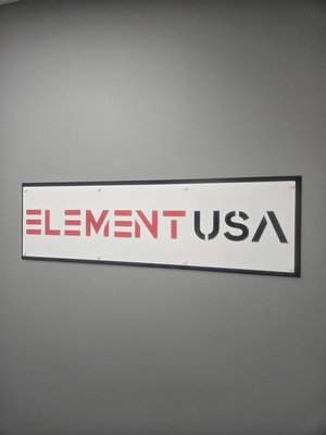 Corporate Art Services - Corporate Art Services: Professional art installation for Elementusa office, featuring secure and level mounting. #CommercialArt #AustinBusiness