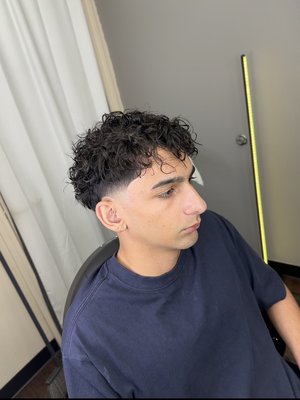 Professional Perm - Achieve lasting, stylish curls with a professional perm! We customize the look to your hair type, adding volume and texture for a low-maintenance style that lasts.