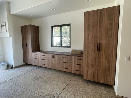 Garage Cabinets Serrano - This a brand new construction install in Serrano. Two garages at one home in this "Metro" finish turned out so nice! I think we can agree that organization is wonderful on its own, but when it can be ultra stylish and fashionable, that's a massive plus! Garage Cabinets Serrano - This a brand new construction install in Serrano. Two garages at one home in this "Metro" finish turned out so nice! I think we can agree that organization is wonderful on its own, but when it can be ultra stylish and fashionable, that's a massive plus!