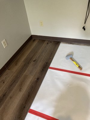 Floor Installation - This customer called us for a tear out and reinstall of the flooring in the rental unit. The carpet had exceeded its life span and was no longer a good candidate for cleaning. Years of rental traffic had left it soiled beyond repair. We tore out and disposed of the old carpet and padding, then installed an underlayment and the vinyl flooring of the customers preference. The flooring was continuously measured and installed to customer specifications and manufacturer guidelines. This installation was completed under budget and took only a few days to tear our, repair, and install.  Floor Installation - This customer called us for a tear out and reinstall of the flooring in the rental unit. The carpet had exceeded its life span and was no longer a good candidate for cleaning. Years of rental traffic had left it soiled beyond repair. We tore out and disposed of the old carpet and padding, then installed an underlayment and the vinyl flooring of the customers preference. The flooring was continuously measured and installed to customer specifications and manufacturer guidelines. This installation was completed under budget and took only a few days to tear our, repair, and install. 