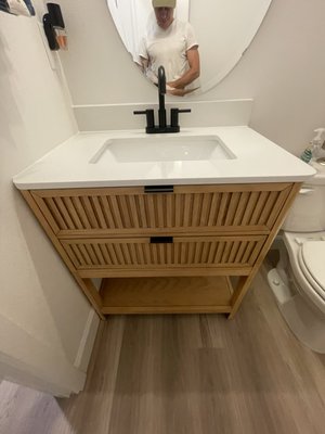 Cabinet Installing - Installed a new cabinet in the bathroom, connected the water and connected the sewerage Cabinet Installing - Installed a new cabinet in the bathroom, connected the water and connected the sewerage