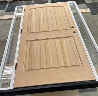 Beautiful door with sidelights! - Stunning wood door with sidelights being prepared in our custom wood shop! Beautiful door with sidelights! - Stunning wood door with sidelights being prepared in our custom wood shop!