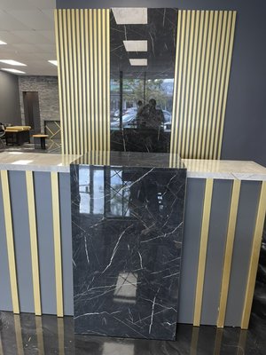 Assembly of a bar and cash counter - My project involved assembling a bar and checkout counter, setting up 5 tattoo workstations and a piercing area. I installed handrails, hung pictures, and arranged drawers, chairs, and tools. Two people completed the work in 8 hours. Project cost: $800