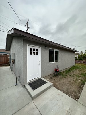 Chula Vista Detached ADU - This accessory dwelling unit was constructed in the back yard of the residence and includes a bedroom, bathroom, laundry area, and kitchen/living area. Chula Vista Detached ADU - This accessory dwelling unit was constructed in the back yard of the residence and includes a bedroom, bathroom, laundry area, and kitchen/living area.