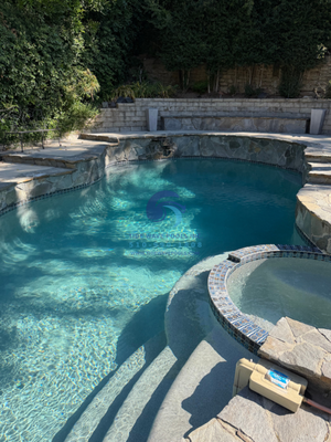 Pool Resurfacing - We transformed this backyard pool with a durable and elegant French Grey Mini Pebble finish, giving it a smooth, modern, and natural stone look. The pool’s drains were also upgraded with new pebble-top split drains, improving both functionality and aesthetics. This resurfacing enhances longevity, water quality, and overall pool safety. Pool Resurfacing - We transformed this backyard pool with a durable and elegant French Grey Mini Pebble finish, giving it a smooth, modern, and natural stone look. The pool’s drains were also upgraded with new pebble-top split drains, improving both functionality and aesthetics. This resurfacing enhances longevity, water quality, and overall pool safety.