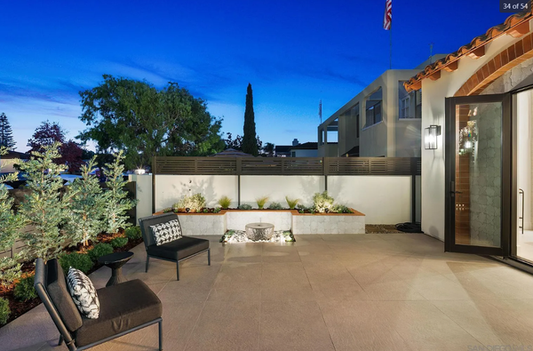 Coronado Village Entry & Courtyard Transformation - A refined front entry and courtyard transformation designed to compliment the homes updated architecture. Layering planting, integrated lighting, and clean hardscape detailing create a cohesive outdoor arrival experience.