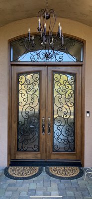Wood doors with wrought iron grills - Some door inspiration photos showing the beautiful result when the elegance and beauty of wood is combined with the strength and rigidity of wrought iron. Wood doors with wrought iron grills - Some door inspiration photos showing the beautiful result when the elegance and beauty of wood is combined with the strength and rigidity of wrought iron.